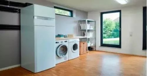 pompa ciepła zamontowana w pralni